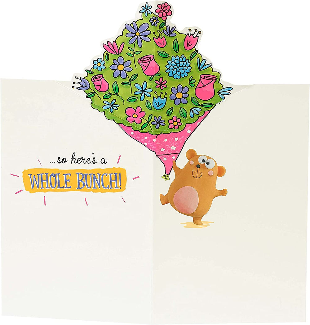 UK Greetings Get Well Soon greeting card featuring a pop-up bear with humorous "Whole Bunch" design.