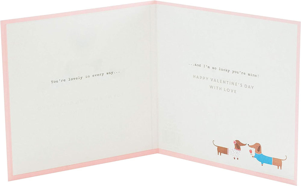 UK Greetings girlfriend Valentine's Day card featuring a cute sausage dog couple design with envelope.