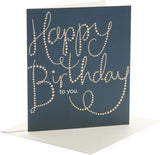 UK Greetings Golden Stars Happy Birthday greeting card featuring gold star accents and cheerful birthday message.