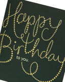 UK Greetings Golden Stars Happy Birthday greeting card featuring a festive design with gold stars and cheerful birthday message.