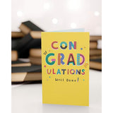 UK Greetings graduation card for him, her, or friend with yellow design and envelope, ideal for celebrating graduation milestones.