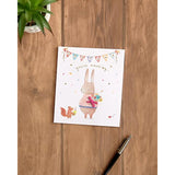 UK Greetings grandma birthday greeting card with envelope featuring a cute rabbit design and colorful illustrations.