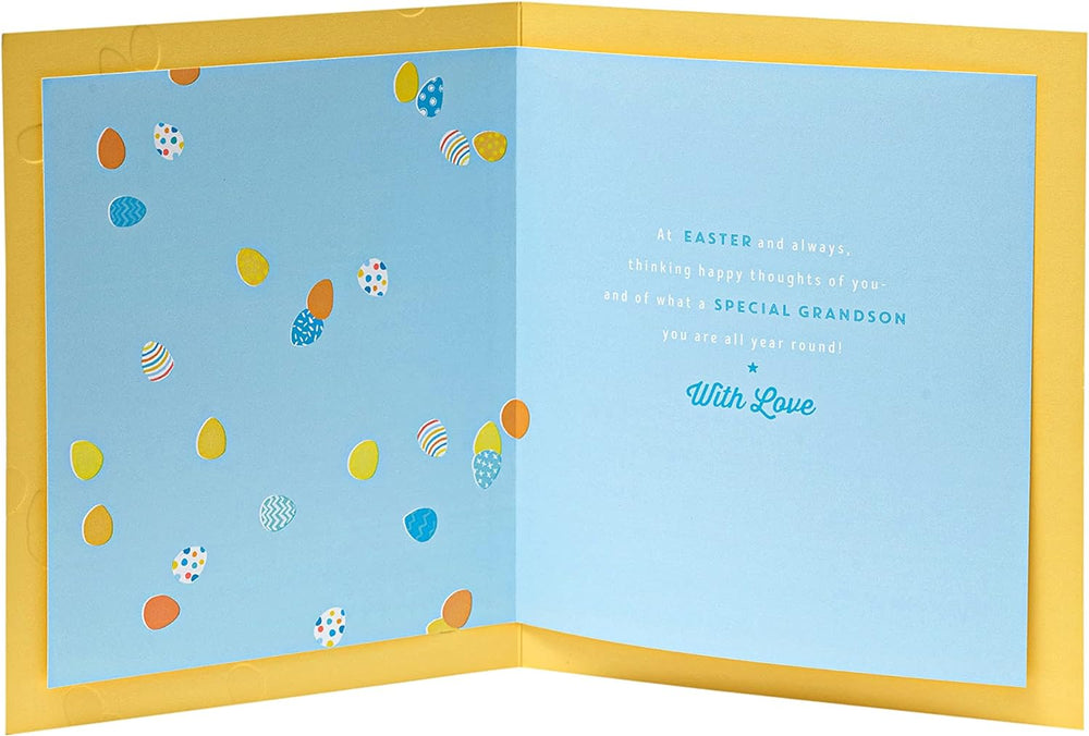 UK Greetings Grandson Easter card with blue egg design and envelope, featuring colorful Easter-themed illustrations.