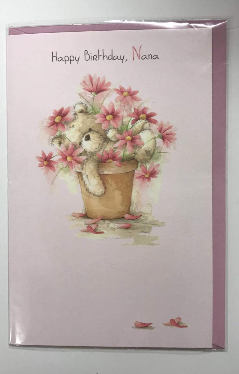 UK Greetings Happy Birthday Nana greeting card showing colorful floral design and cheerful message inside.