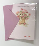UK Greetings Happy Birthday Nana greeting card with colorful floral design and heartfelt message inside.