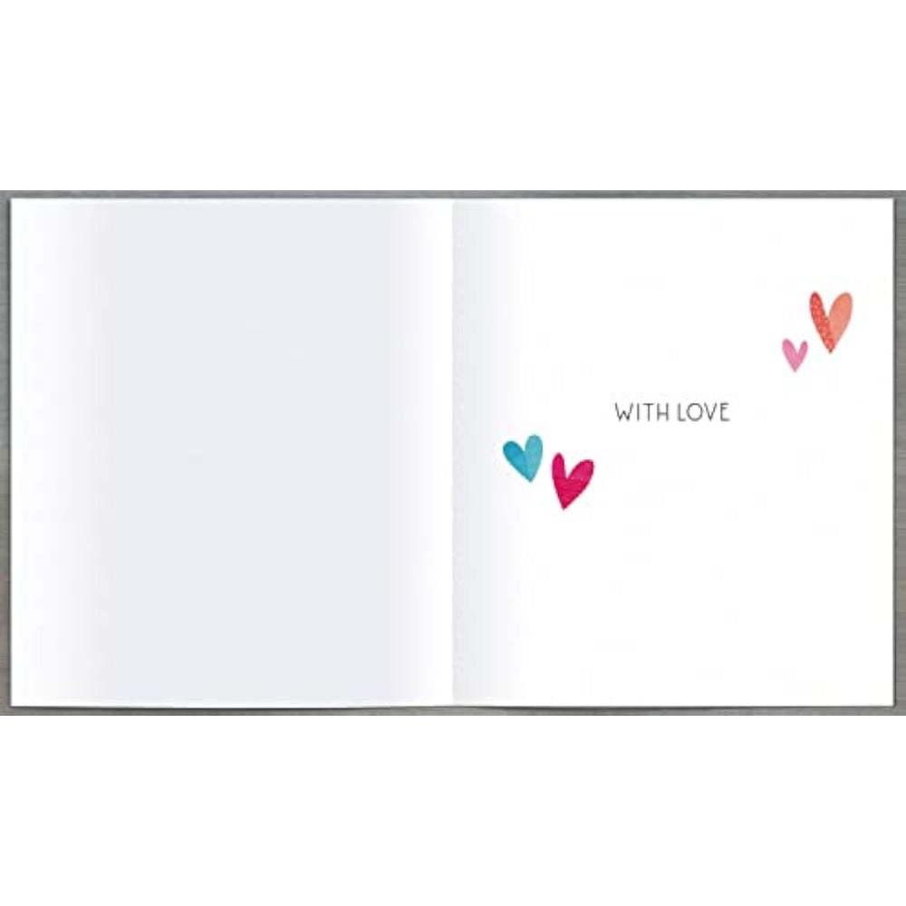 UK Greetings Heart Anniversary Card featuring a romantic design, perfect for celebrating special occasions with loved ones.