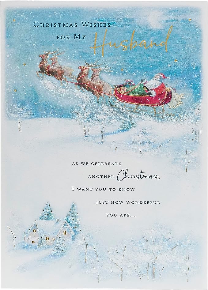 UK Greetings Christmas card featuring a Santa and sleigh design for husbands, festive holiday greeting card with holiday scene.