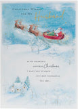 UK Greetings Christmas card featuring a Santa and sleigh design for husbands, festive holiday greeting card with holiday scene.