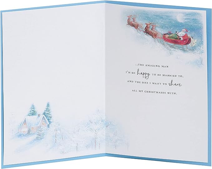 UK Greetings husband Christmas card featuring Santa and sleigh design, festive holiday greeting card for husbands.