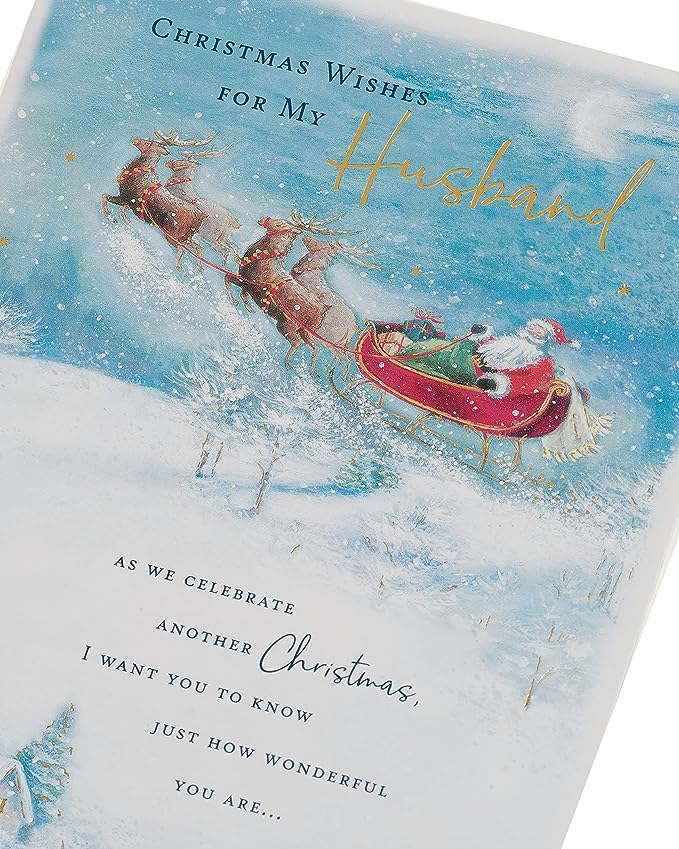 UK Greetings husband Christmas card featuring Santa and sleigh design, perfect for holiday greeting messages.