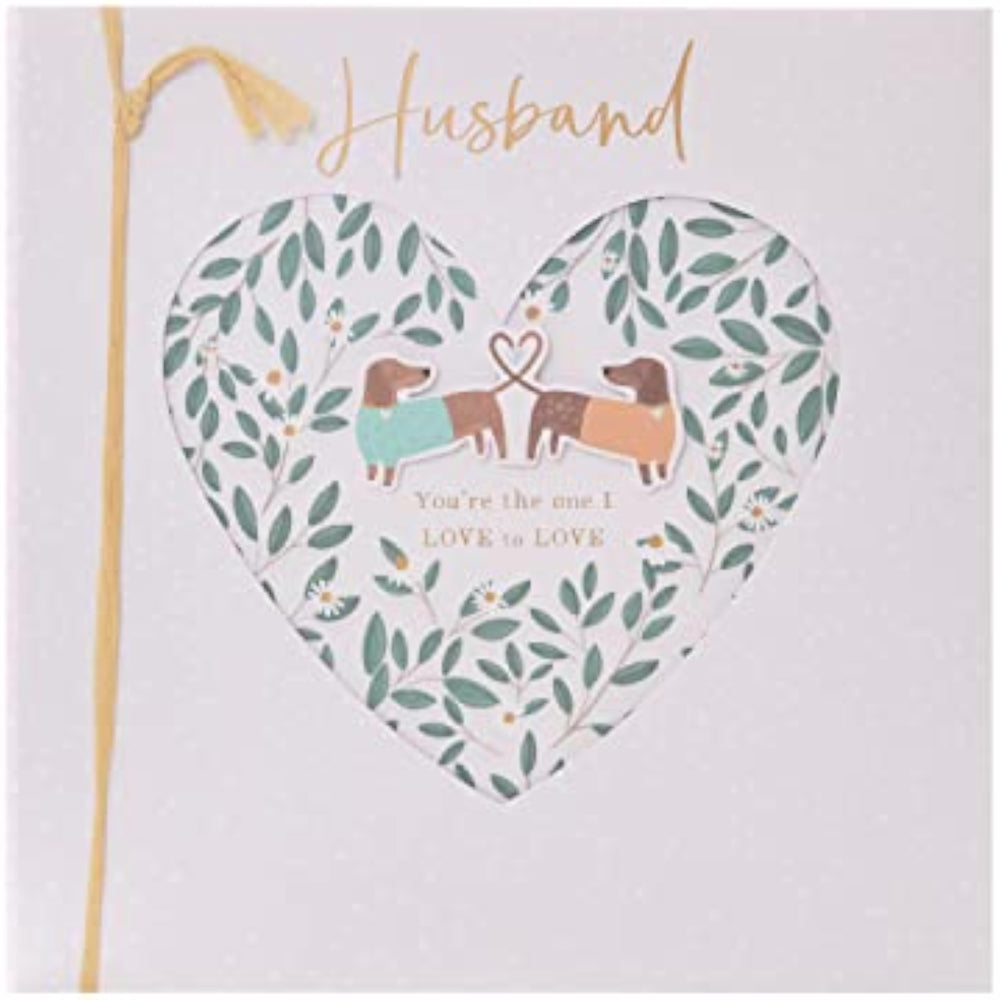 UK Greetings romantic greeting card for husband featuring a pair of adorable sausage dogs, perfect for special occasions.