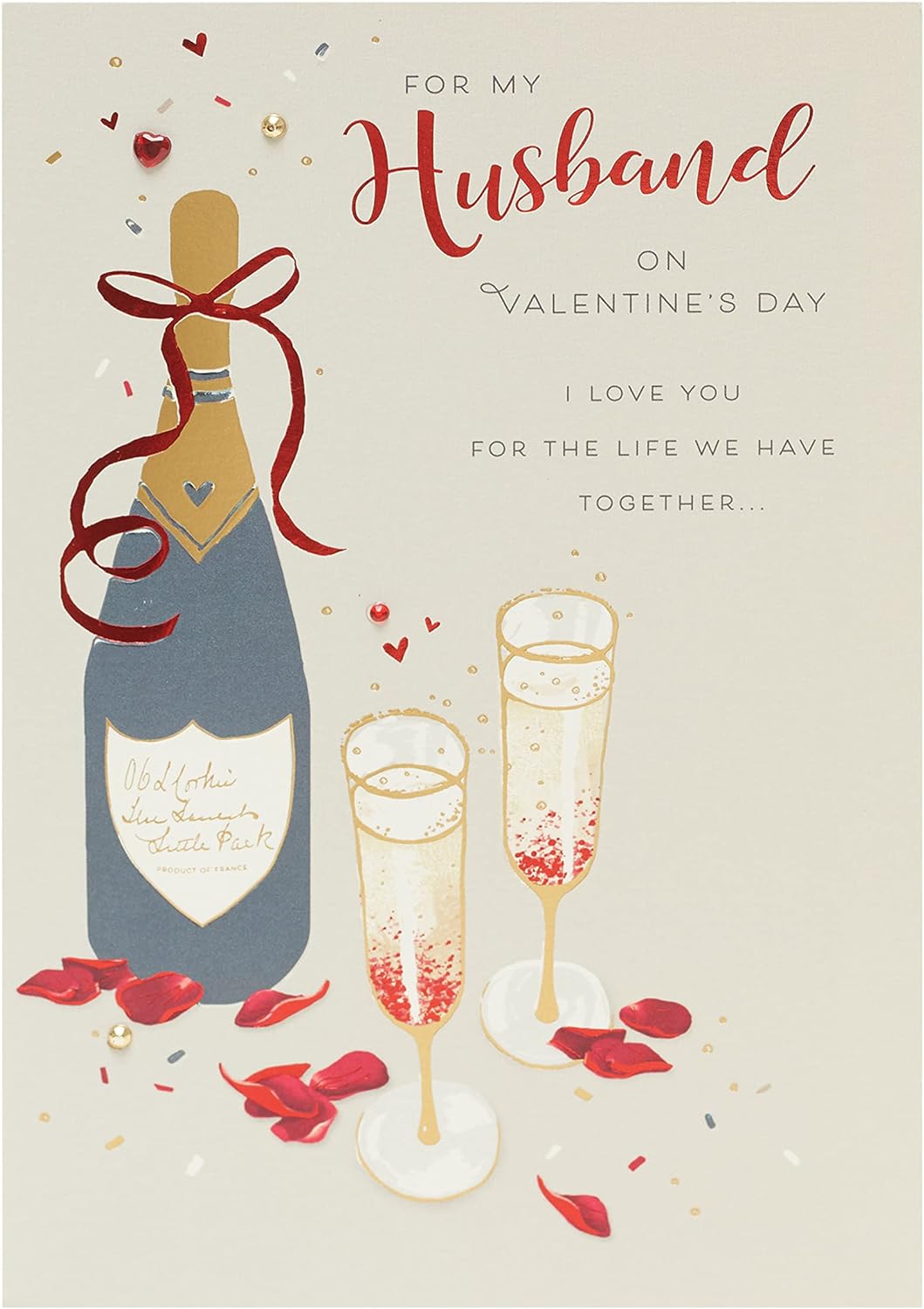 UK Greetings husband Valentine's Day card with envelope featuring an elegant champagne design, perfect for expressing love.