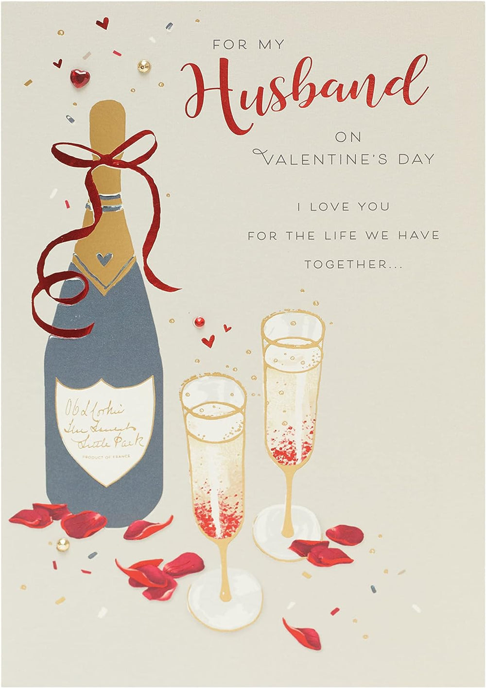 UK Greetings husband Valentine's Day card with envelope featuring an elegant champagne design, perfect for expressing love.
