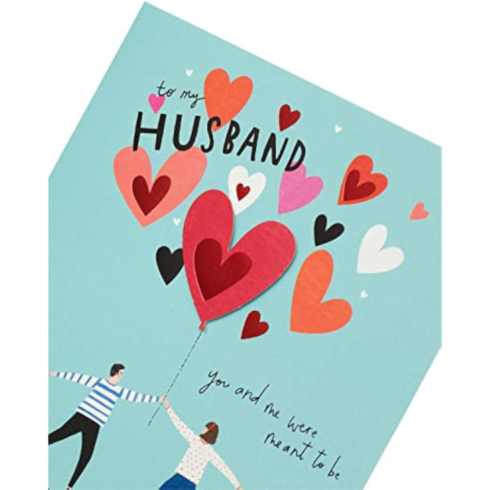 UK Greetings husband Valentine’s Day greeting card with modern design and envelope, featuring contemporary artwork for special occasion.