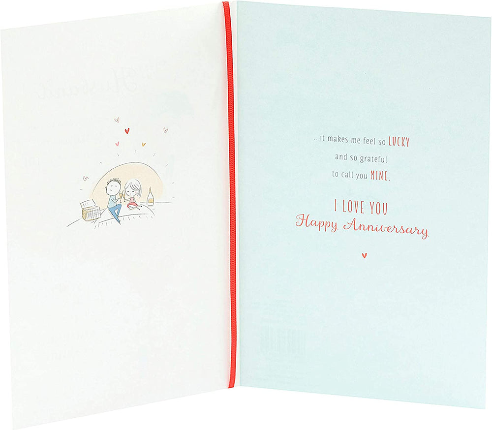 UK Greetings wedding anniversary greeting card for husband, featuring heartfelt wishes and decorative design.