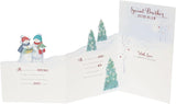 UK Greetings illustrated snowmen greeting card with holly and basket, designed for brother and sister-in-law.