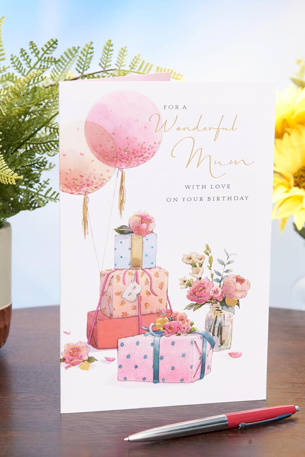UK Greetings birthday greeting card for mum featuring colorful floral design and heartfelt message in a greeting card.