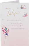 UK Greetings open greeting card featuring "What Is a Wife" message, perfect for special occasions.