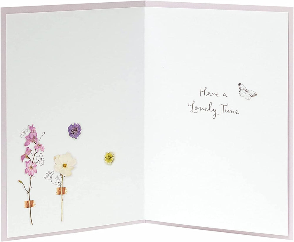 UK Greetings Into the Meadow floral birthday card featuring colorful floral design, perfect for celebrating special occasions.