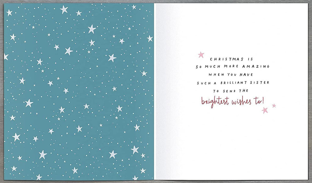UK Greetings jumper design Christmas card for sister, featuring festive holiday imagery and heartfelt greeting on a greeting card.