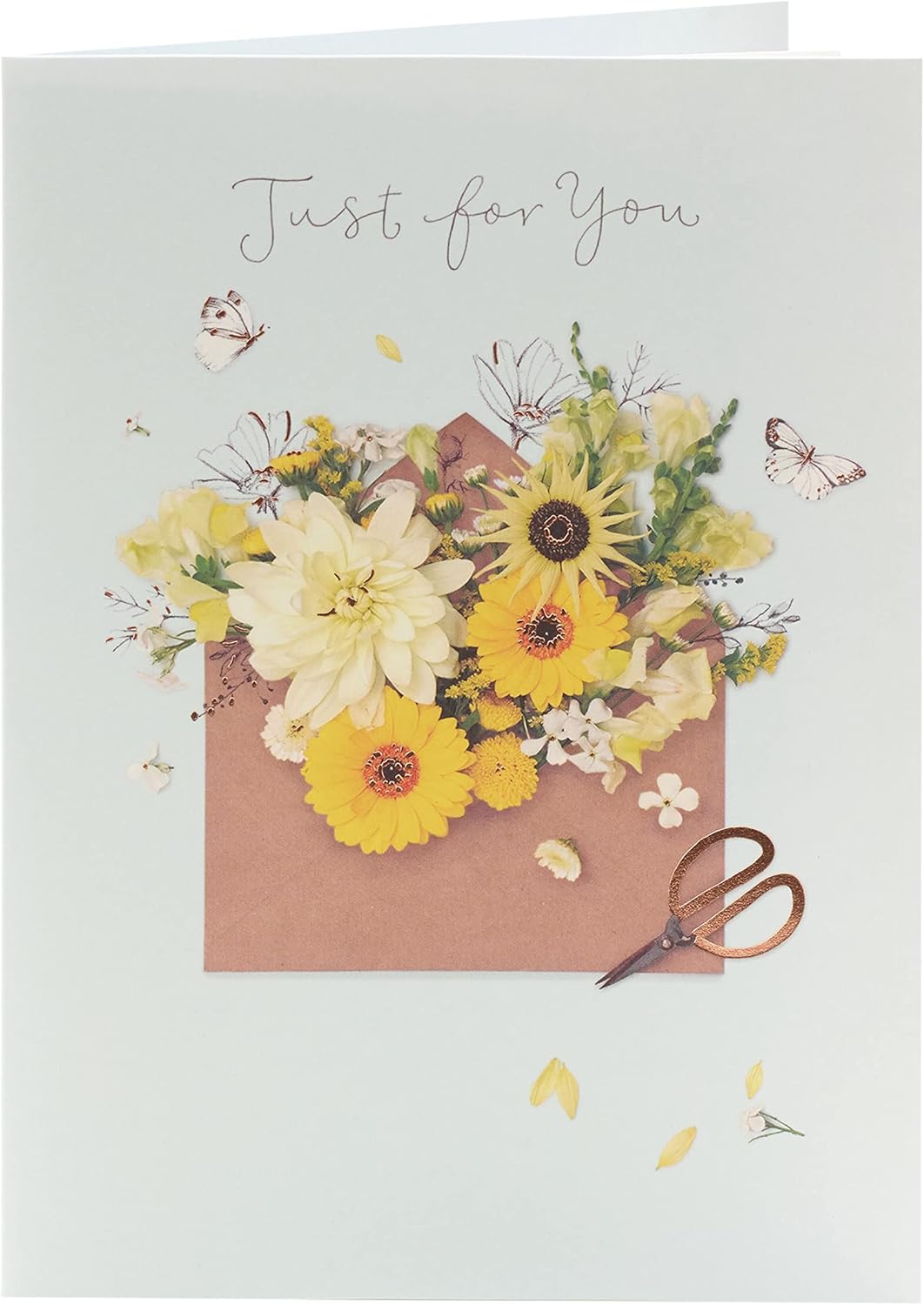 UK Greetings floral birthday card featuring a colorful floral design, perfect for celebrating special occasions.