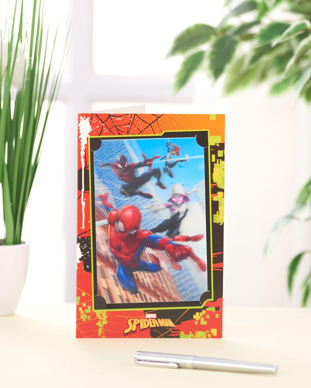 Colorful UK Greetings kids birthday card with fun illustrations, ideal for juvenile greeting cards, featuring bright and playful designs.