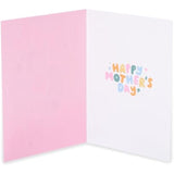 UK Greetings Mother's Day card featuring the "I Got It from My Mama" design with colorful floral accents and heartfelt message.