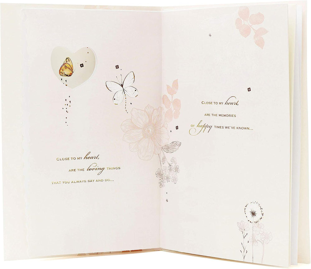 UK Greetings heartfelt birthday card featuring a loving wife theme, with a romantic design and heartfelt message inside.