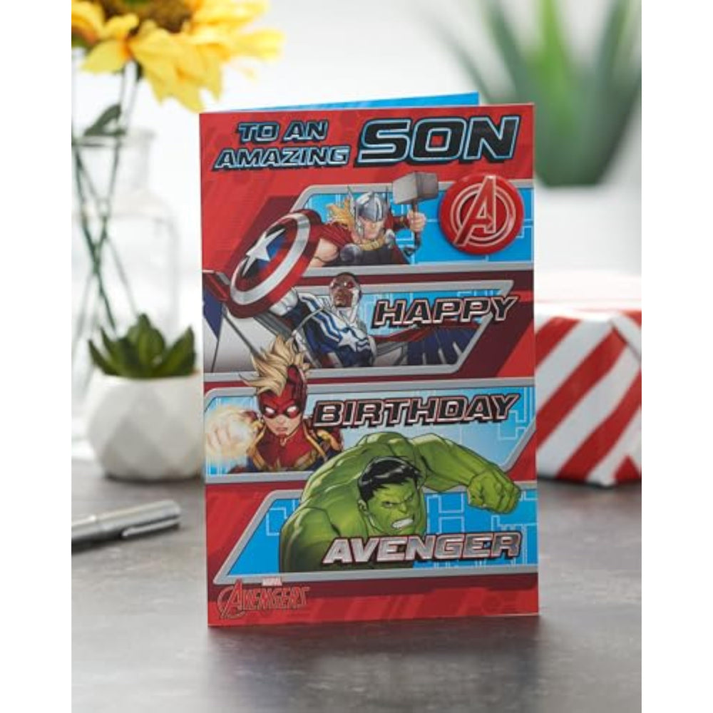 UK Greetings Marvel Avengers birthday card for son, featuring a red split design with superhero imagery on the front.