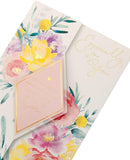 UK Greetings Mother's Day card with envelope featuring a beautiful floral design, perfect for celebrating moms.