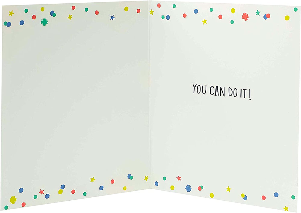 UK Greetings multicolour design good luck exam card featuring vibrant colors and cheerful message for students.