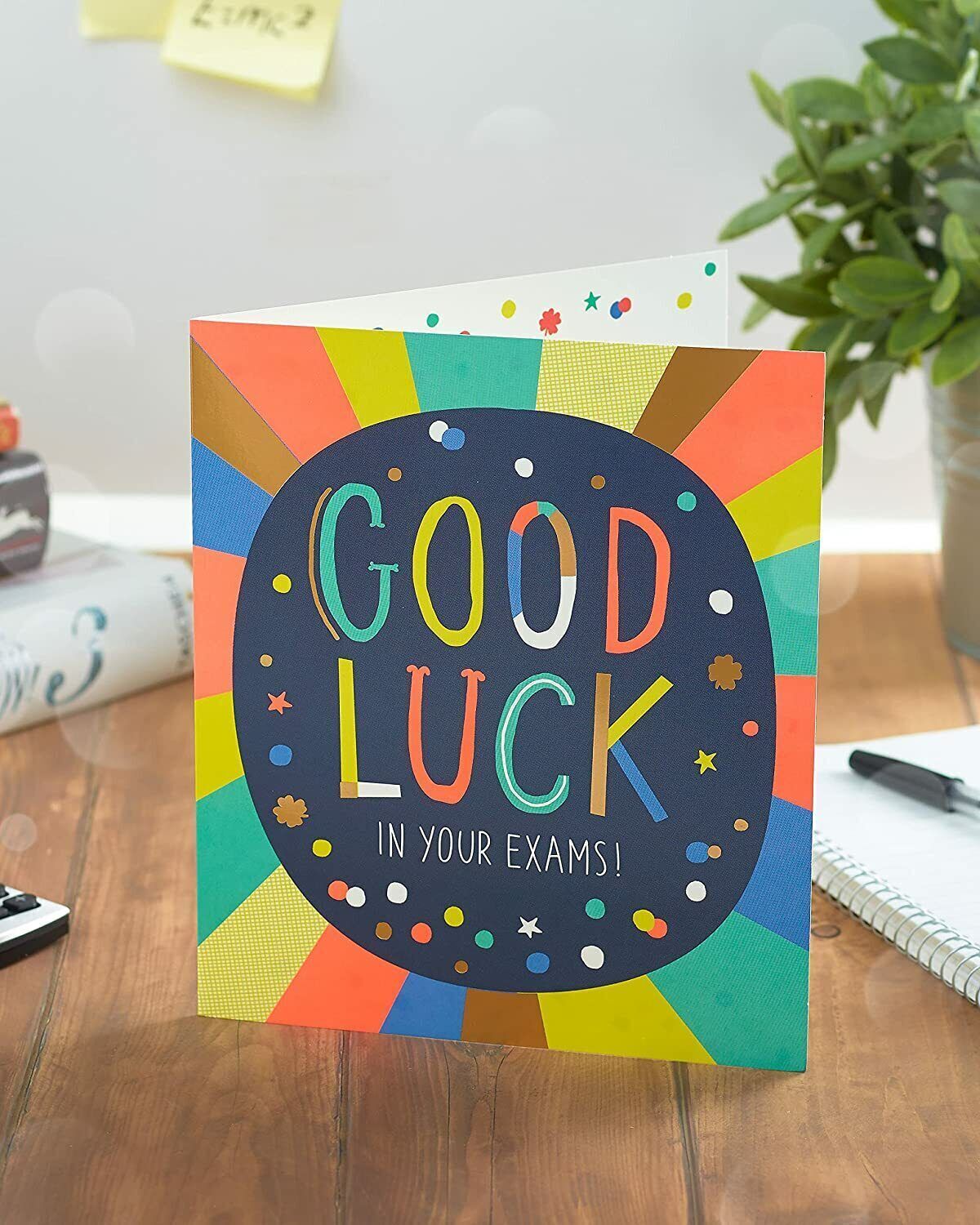 UK Greetings multicolour design good luck in your exams greeting card with cheerful patterns and supportive message.