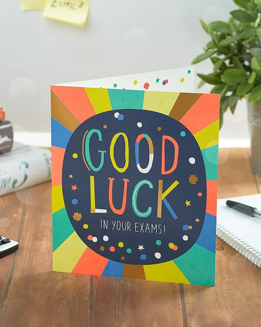 UK Greetings multicolour design good luck in your exams greeting card with cheerful patterns and supportive message.