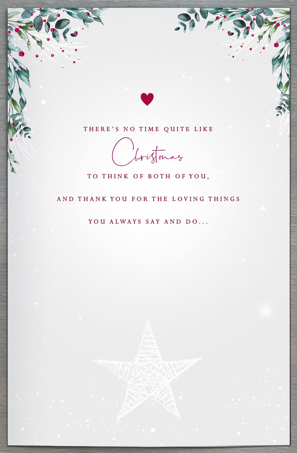 UK Greetings Mum and Dad fireplace Christmas greeting card with festive holiday design and heartfelt message.
