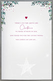 UK Greetings Mum and Dad fireplace Christmas greeting card with festive holiday design and heartfelt message.