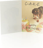 UK Greetings humorous birthday card featuring a cake and playful message, designed for celebrating special occasions.