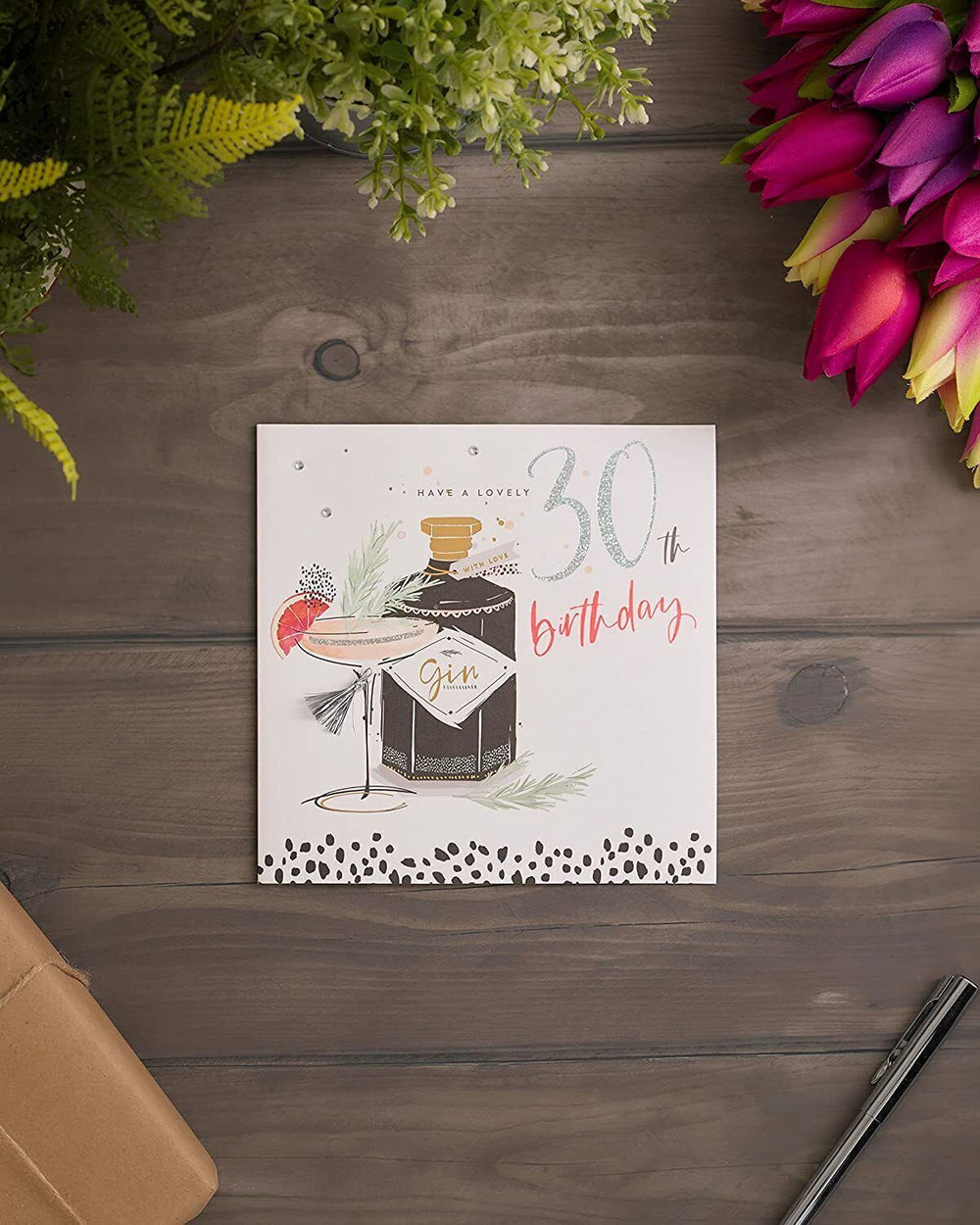 UK Greetings Neon Lustre 30th Birthday Gin Greetings Card, colorful design with festive lettering and gin-themed graphics.