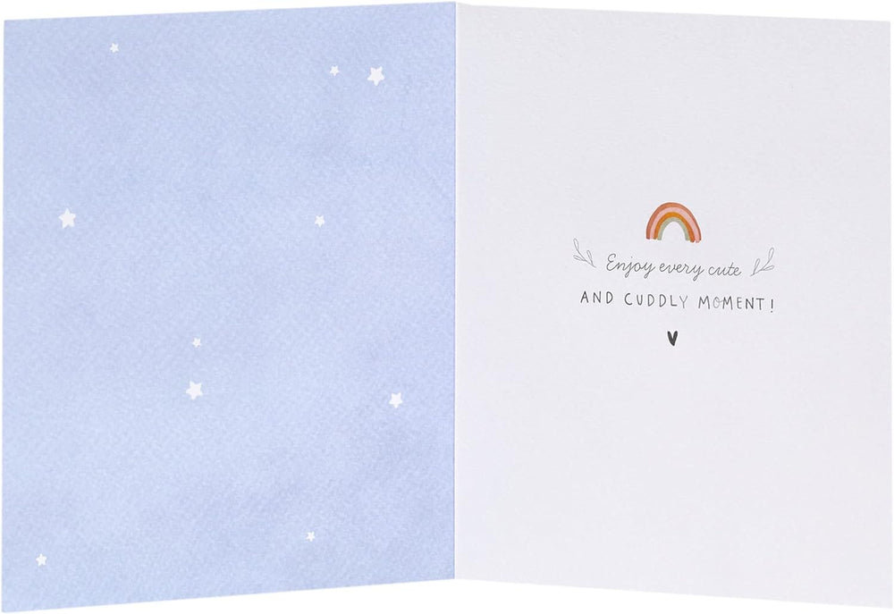 UK Greetings New Baby Boy greeting card with washing line design, featuring cute baby clothes hanging on a line.