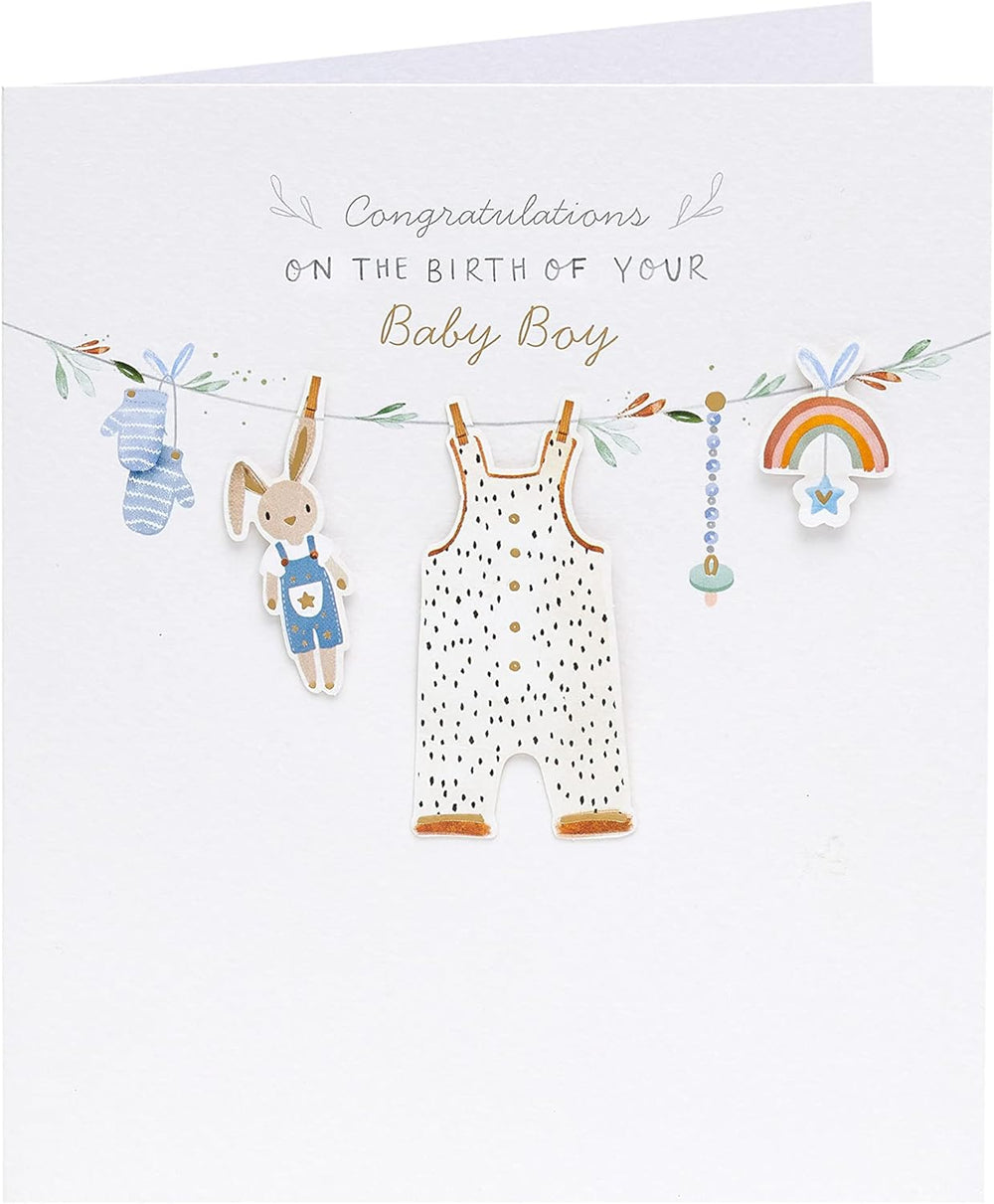 UK Greetings New Baby Boy greeting card featuring a washing line design with colorful baby clothes hanging.