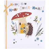 UK Greetings new home greeting card for him, her, or friend featuring a cute hedgehog design with an envelope.