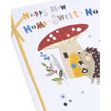 UK Greetings New Home Card for Him, Her, or Friend featuring a charming hedgehog design with an envelope.