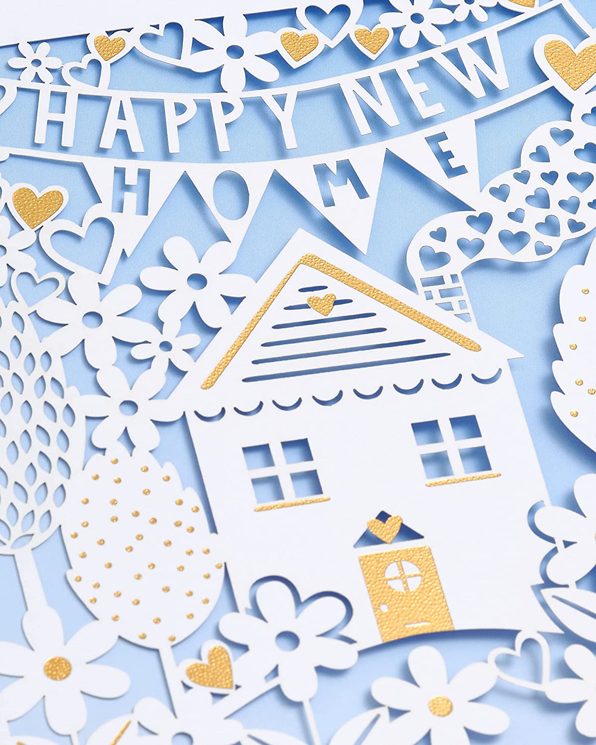 UK Greetings luxury laser cut congratulations card for new home, featuring intricate design and elegant greeting for special occasions.