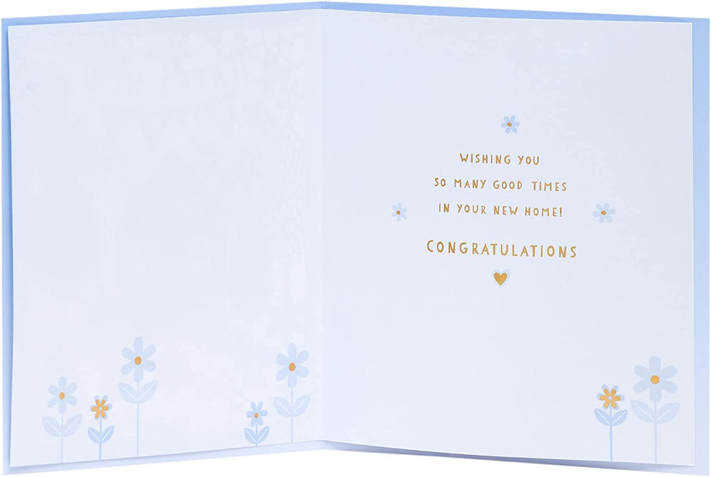 UK Greetings New Home luxury laser cut congratulations card featuring intricate design and text for celebrating new beginnings.