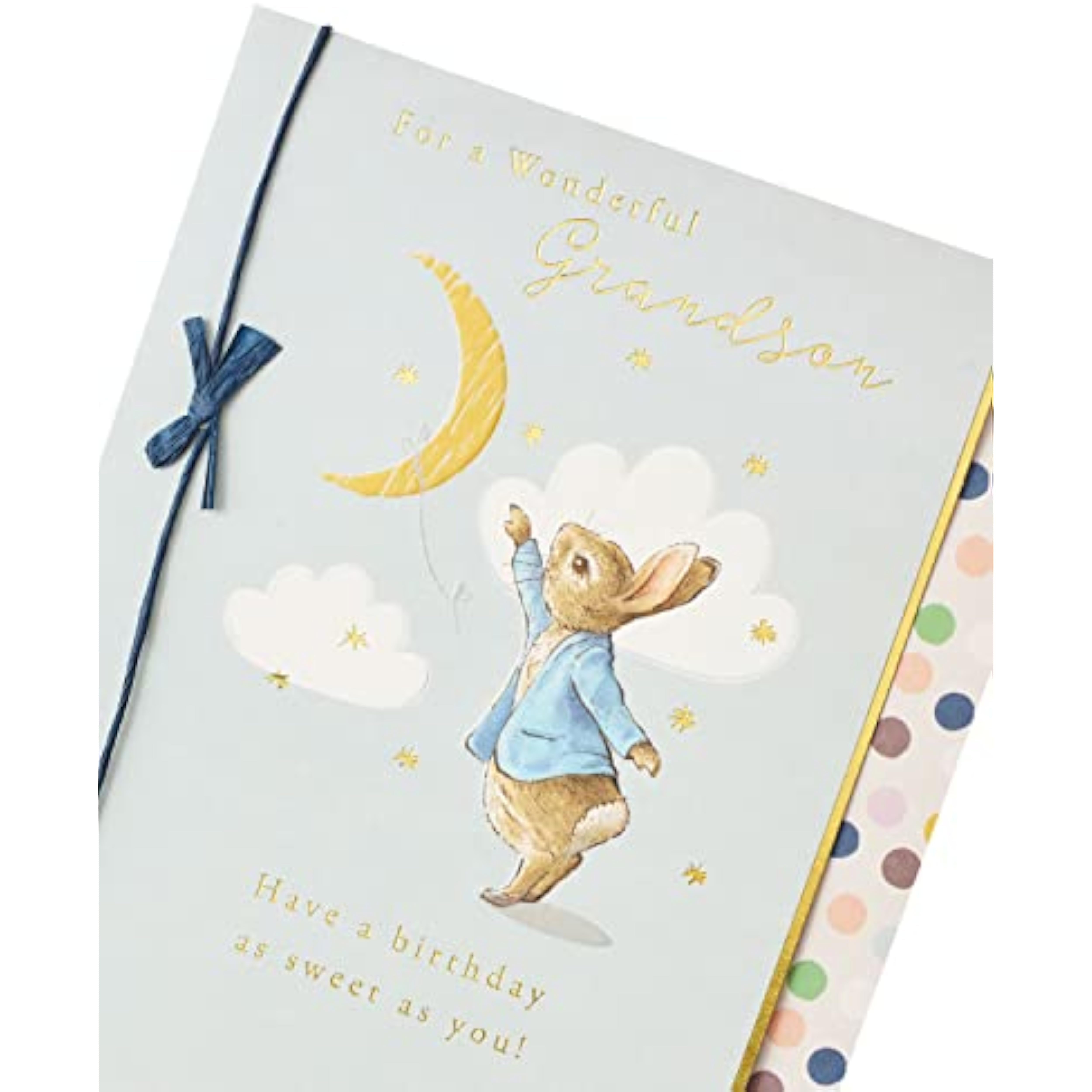 UK Greetings Peter Rabbit birthday card for grandson featuring a charming blue design and colorful illustrations.