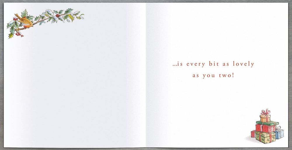 UK Greetings Peter Rabbit Christmas greeting card featuring charming illustration, designed to send holiday wishes.