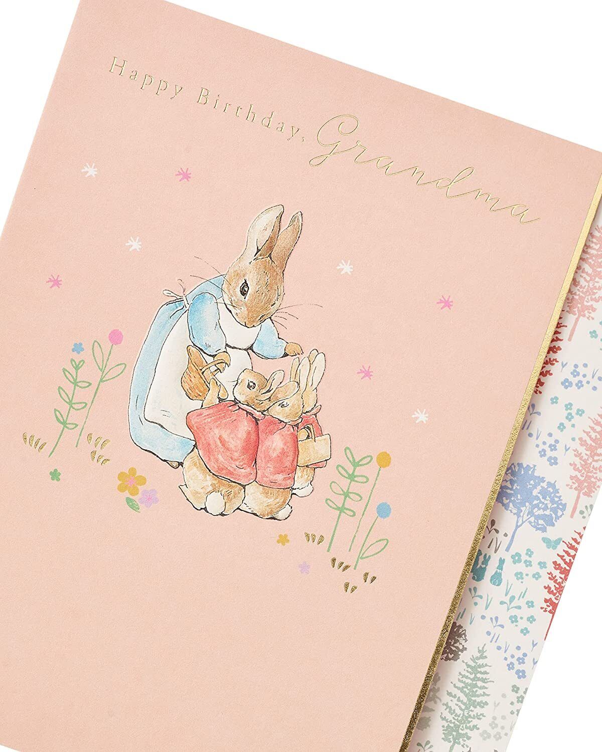 UK Greetings Peter Rabbit Grandma birthday card featuring colorful illustrations of Peter Rabbit and floral designs.