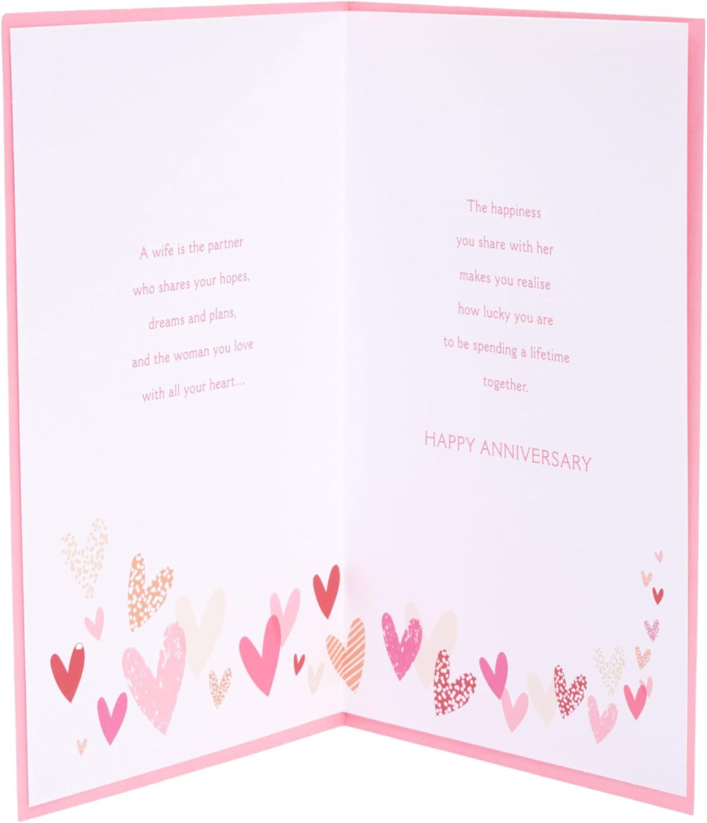 Pink and gold hearts design wife anniversary greeting card by UK Greetings, featuring romantic artwork for special occasions.