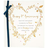 UK Greetings Romantic 1st Anniversary Card featuring floral and heart motifs, ideal for celebrating first wedding anniversary.