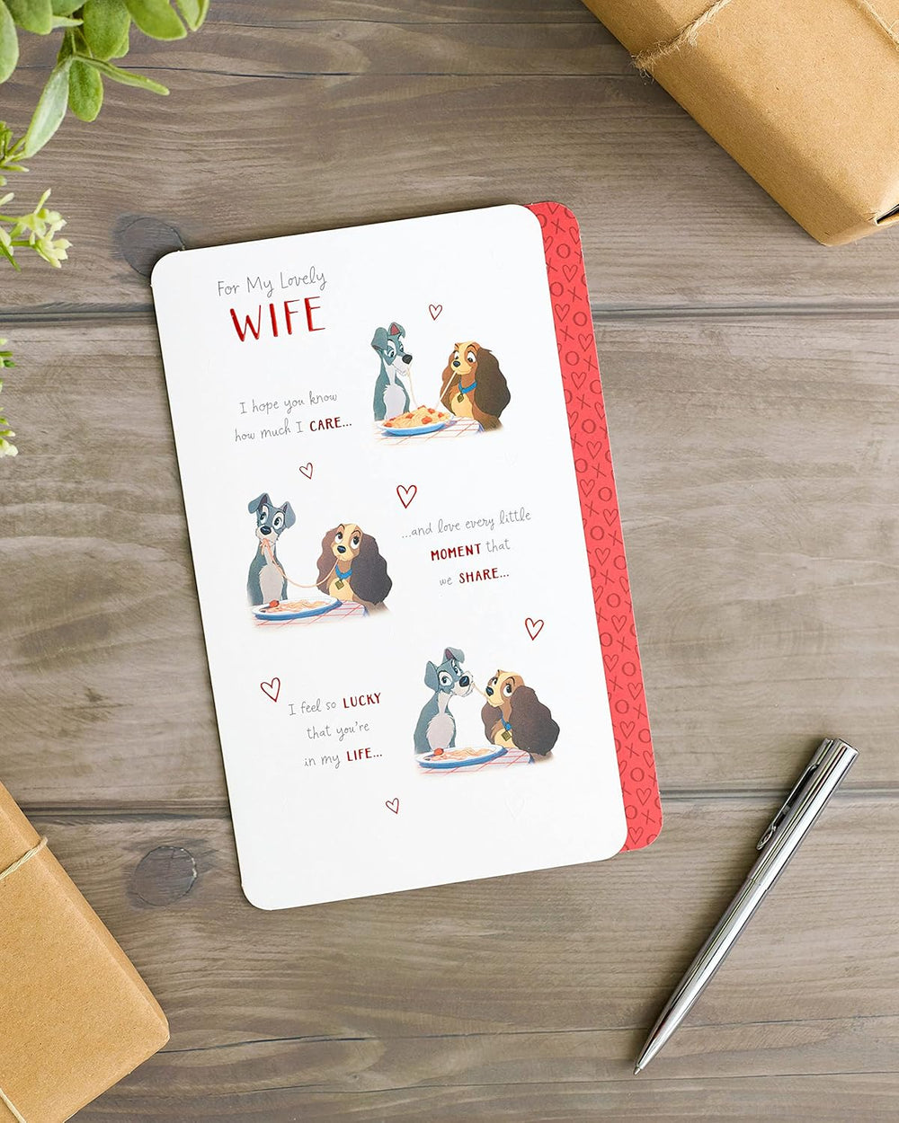 UK Greetings Romantic Wife Birthday Card featuring Lady and the Tramp, with romantic illustrations for special occasions.