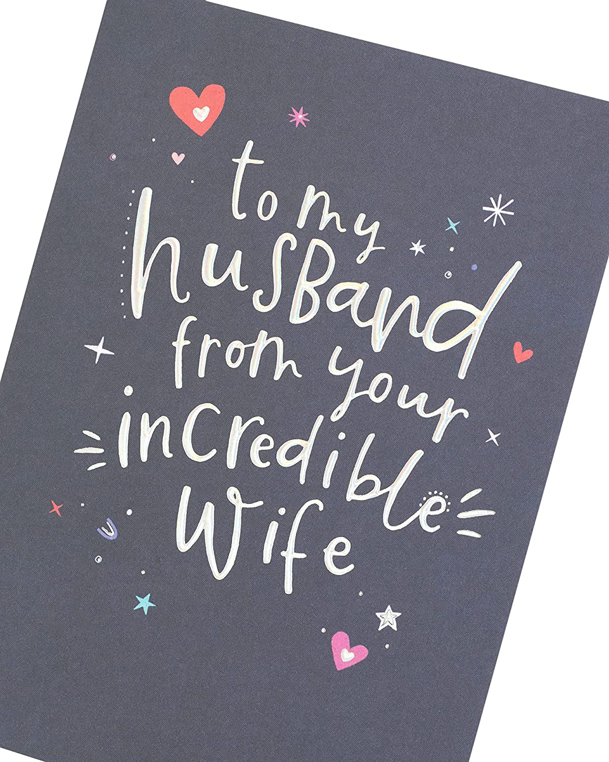 UK Greetings silver foil lettering husband birthday greeting card with elegant design and festive message.